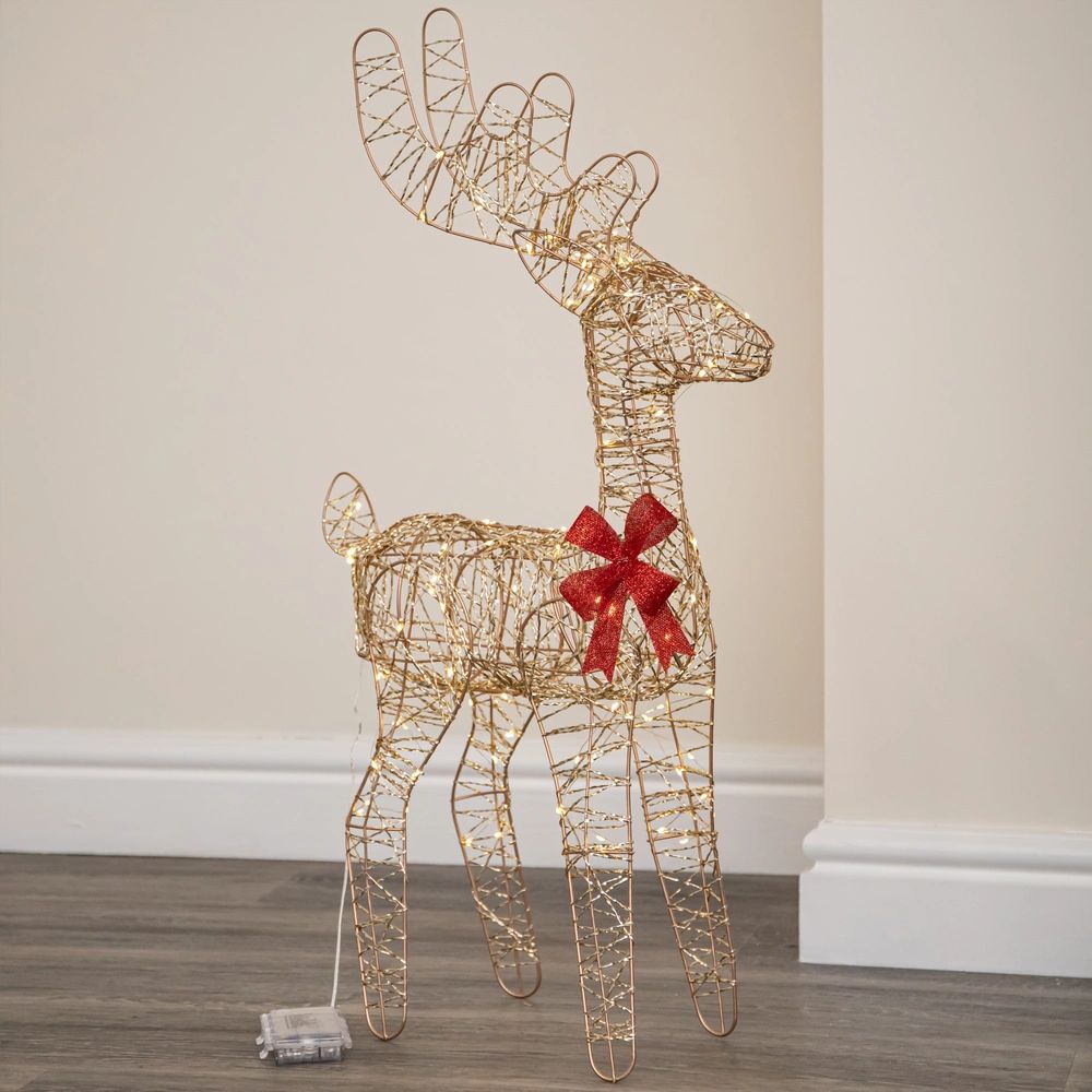 Christmas 74cm PreLit Golden Elegance Twist Standing Reindeer with Red Bow & 100 Warm White LED Festive Light-Up Decoration