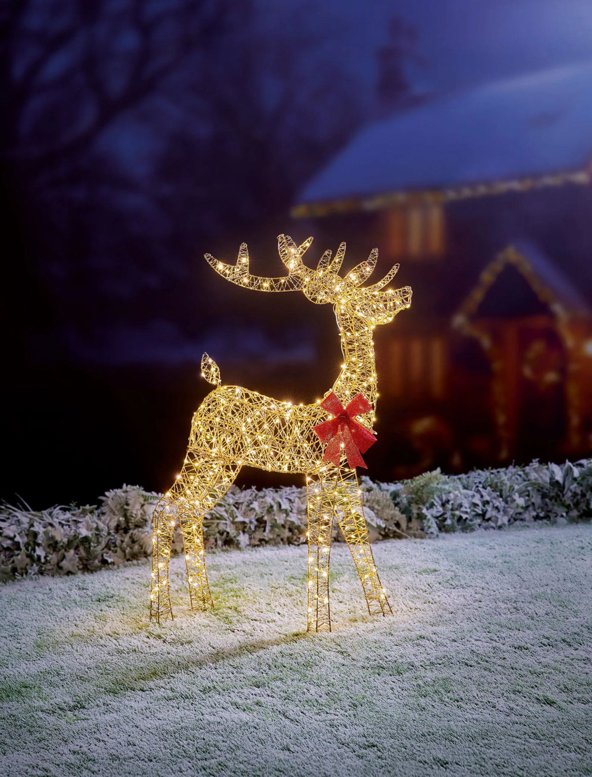 Christmas 1m PreLit Golden Elegance Twist Standing Reindeer with Red Bow & 300 Warm White LED Festive Light-Up Decoration
